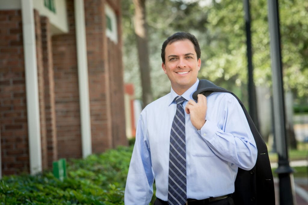 Dr Hervas standing outside his office